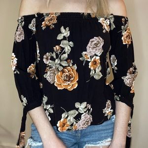 Navy floral top with medium length sleeves in size s